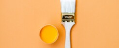paint-can-and-brush-on-orange-background-house-exlusive-home-improvement-leads